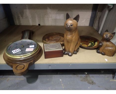 Wall mounting oak barometer with a mahogany box with silver plated mount, carved cats and plates. Not available for in-house 