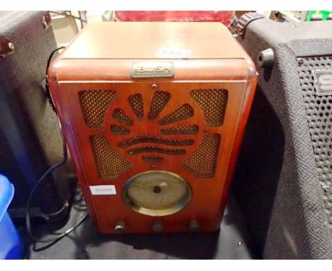 Bush vintage style, mahogany effect cased radio, H: 34cm. All electrical items in this lot have been PAT tested for safety an