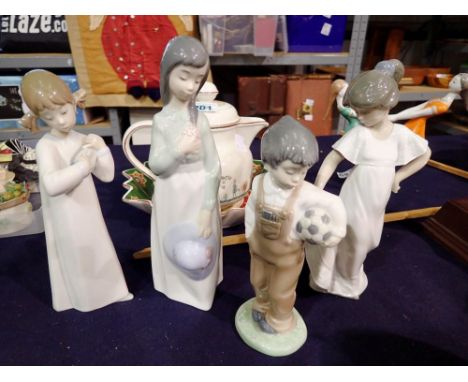 Four Nao and Lladro figurines. Not available for in-house P&amp;P 
