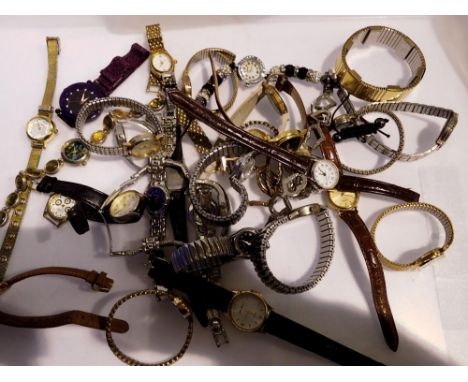 Thirty one ladies quartz wristwatches, needing new batteries. UK P&amp;P Group 1 (£16+VAT for the first lot and £2+VAT for su