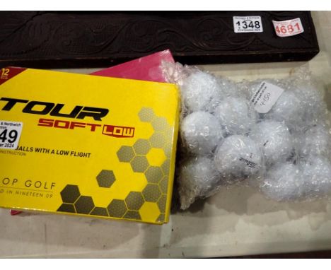 Pack of twelve Dunlop Tour golf balls, with a pack of fifteen Dunlop DDH golf balls and a bag of approximately fifteen mixed 