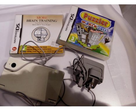 Nintendo DS, power supply and two games. UK P&amp;P Group 1 (£16+VAT for the first lot and £2+VAT for subsequent lots)
