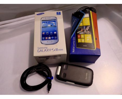 Three mobile phones, including a Nokia Lumia 520. UK P&amp;P Group 1 (£16+VAT for the first lot and £2+VAT for subsequent lot