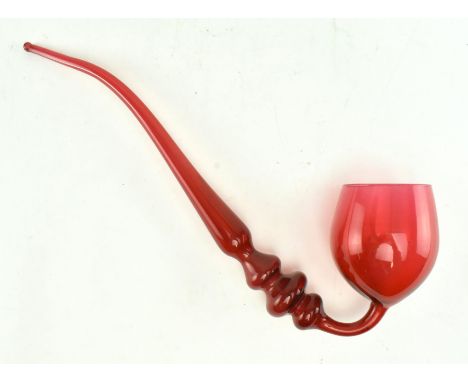 A mid 19th century c1850 Victorian ruby glass pipe. The pipe hand blown and featuring a trio of knops to the stem. Measures a