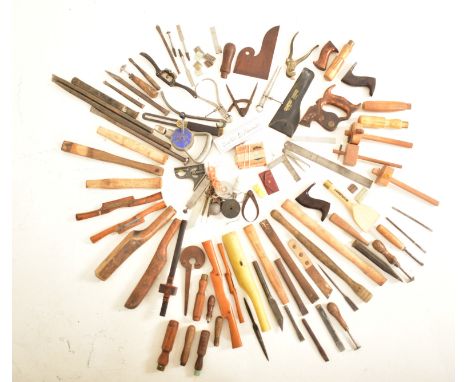 Carpentry &amp; woodworking. A collection of assorted tools. The lot to include a variety of wooden handles and implements, l