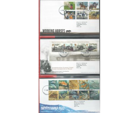 Stanley Gibbons First Day Covers Album Blue with approx 50+ FDCs from 2014 Working Horses to 2018 The RAF Centenary. All with
