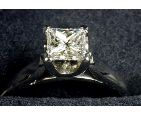 A platinum and diamond solitaire ring, princess cut, with diamond certificate, carat weight 0.9, clarity SI1, colour G.