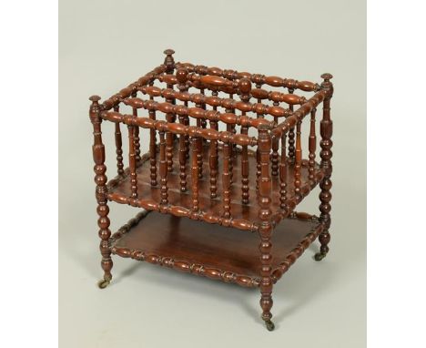 A 19c mahogany four division Canterbury baluster and bobbin ring turned, with four divisions with central carrying handle on 