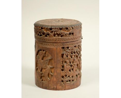 A 19c Chinese carved bamboo tea caddy with metal liner, 7h.