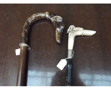 Shoe horn and walking stick, both in the form of greyhounds 