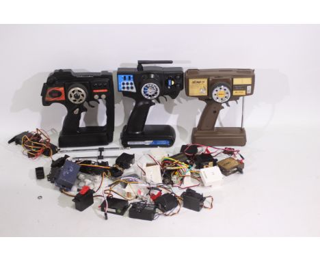 HiTec - Carson - Others - Three unboxed RC controllers with a quantity of loose / spare parts mainly associated with RC contr