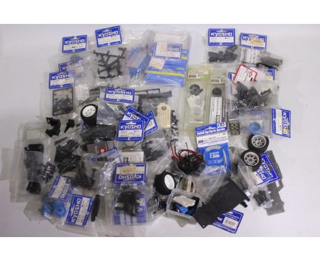 Kyosho - A large quantity of mainly Kyosho spare parts suitable for RC car modelling. Majority of parts appear to appertain t