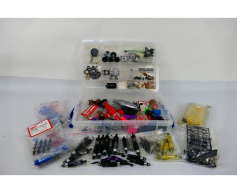 Kyosho - A quantity of mainly Kyosho spare parts suitable for RC car modelling. A few parts appear to be sealed in their pack