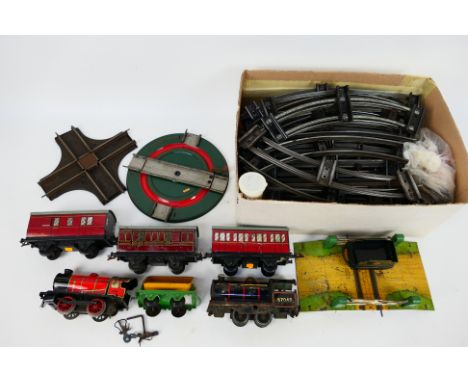 Hornby - Brimtoy - A collection of O gauge items including a Brimtoy loco number 67040, a Hornby loco type M1 in red, 3 x mar