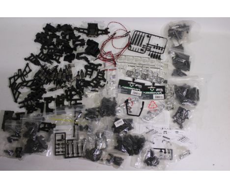 Kyosho - Absima - Other - A large collection of predominately loose plastic spare parts and accessories suitable for 1:10 sca