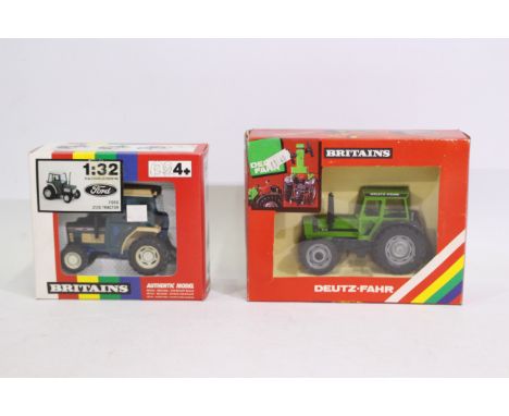 Britains. Two boxed Britains Tractors appearing in VG condition in Good boxes. #9495 Ford 2120 Tractor, some warping to wheel