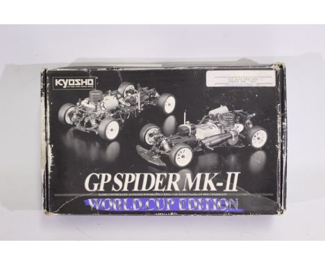 Kyosho - A quantity of mainly Kyosho spare parts suitable for RC car modelling. Some parts are in sealed packaging whilst som