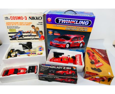 Nikko - Taiyo - Eagleton - 4 x boxed remote control models, Nissan Fairlady Z, Cosmo-3, Ferrari Formula Racer and Peugeot 206