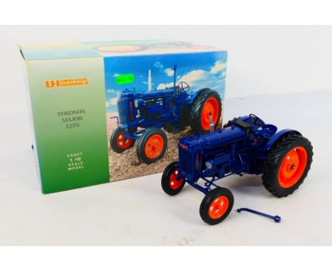 Universal Hobbies - Tractor. A boxed diecast metal and plastic 1/16 scale #UH2638U Fordson Major E27N tractor model in Good c