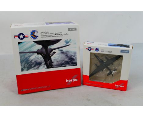 Herpa - Two boxed diecast 1:200 scale military aircraft from Herpa. Lot consists of 559263 U.S. Air Force Rockwell B-1B Lance