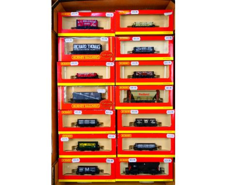 Hornby - A rake of 14 OO gauge wagons. Lot includes Hornby R6071 21 Ton large mineral wagon "Richard Thomas"; R6337 3 plank w