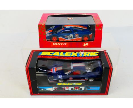 Scalextric - Ninco - 2 x boxed slot cars in 1:32 scale in Gulf livery, Ferrari F40 # C.589 and a McLaren F1 GTR # 50140. They