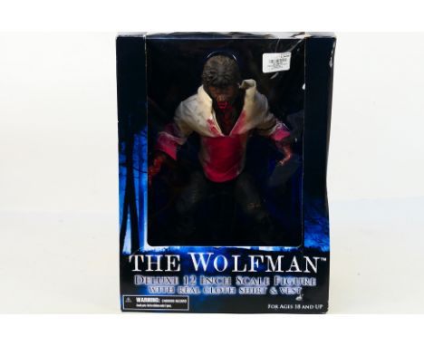 Mezco - The Wolfman. A Boxed, opened #R1768381 "The Wolfman" 1/6 scale action figure by Mezco Toys. Appearing Mint in Box wit