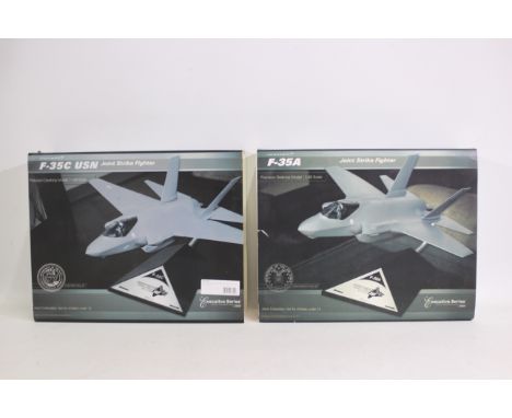 Daron - Two boxed Daron 'Executive Series' 1:48 scale desk top models. Lot includes an F-35C Joint Strike Fighter together wi