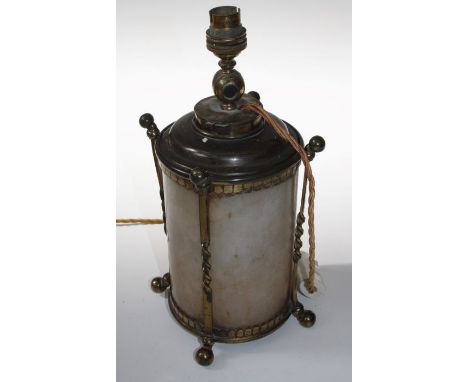 A 19th century brass and onyx paraffin table lamp of drum form on four ball feet. Converted for electricity. 32cm (excluding 