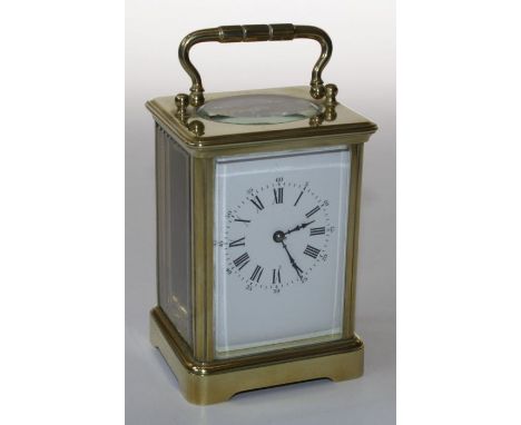 A large 20th century brass, five glass carriage timepiece, the eight day movement faced by enamel Roman dial with Arabic oute