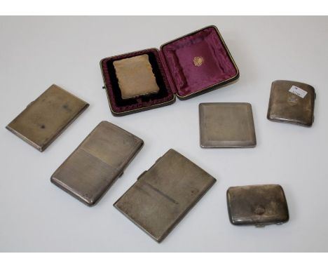 A Victorian style silver card case, inscribed, Birmingham 1908 H9.5cm together with five other various silver cigarette cases