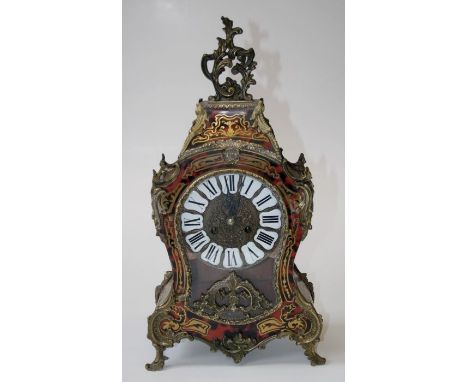 A Louis XV style Boulle mantle clock, the gilt metal applied waisted balloon case enclosing an eight day ' ting tang' bell st