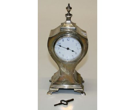 An Edwardian silver cased mantel timepiece having a lever platform movement and enamel dial, H24cm, London 1905