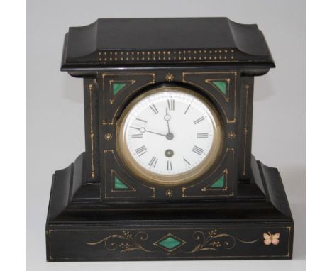 A late 19th century French mantle clock, the malachite inlaid pagoda top slate case, enclosing an eight day movement faced by