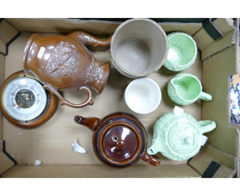 A mixed collection of items to include: Embossed earthenware jug, Barometer, early Demerara Sugar Storage pot etc 