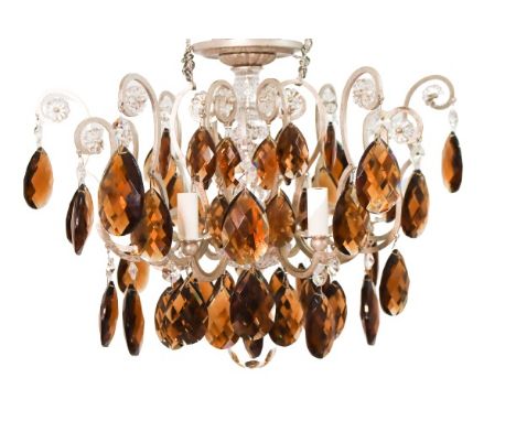 Exquisite and elegant chandelier comprised of amber colored crystal tear-drop prisms, smaller clear prisms, all surrounding a