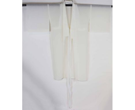 A soft white elegant Japanese vintage kimono. The size is 54 x 52 in. The kimono is a traditional Japanese garment and the na