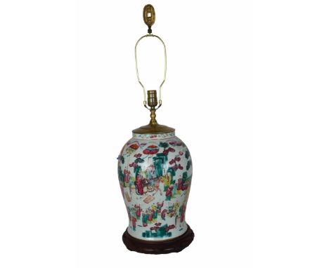 Chinese porcelain vase lamp on a wooden base, with imagery of a colorful celebration procession against a white background. U