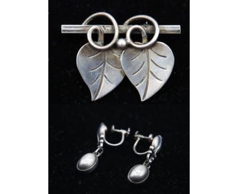 Unique Art Nouveau vintage design, marked and numbered sterling silver. Pin marked 109 USA and earrings marked #17.Denmark.