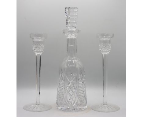 Crystal candlestick and decanter set. Candlestick Sizes: 10 x 4 in. Decanter Size: 13 x 4 1/2 in. Please note that all sales 