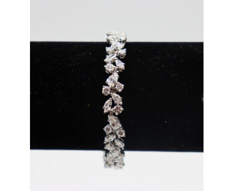 Vintage Ladies Diamond Cluster Style Bracelet with 10 pear cut, 29 round brilliant cut diamonds, 20 marquise cut diamonds, we