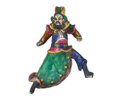 Bearded figure in motion. Ceramic tiles such as this one have been placed on Chinese temple roofs for centuries to ward off e