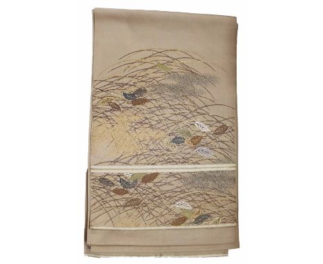 Japanese vintage obi in tan with floral embroidery.  The size is 154 in long x 12 in.An obi is a belt worn with both traditio