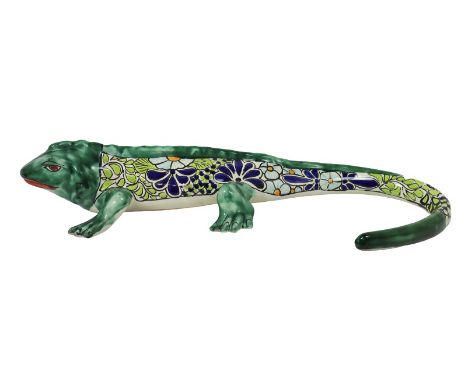 Large ceramic lizard with colorful decorative design, unsigned.Size: 5 x 25 x 15 in. Please note that all sales are final. No