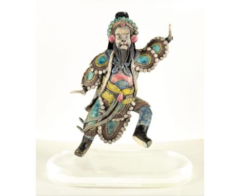 Bearded figure in motion. Ceramic tiles such as this one have been placed on Chinese temple roofs for centuries to ward off e