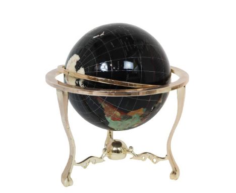 Globe is supported by three footed base. The globe is detailed with various stones. Has ability to spin 360 degrees on Y and 