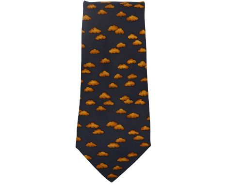 Hermes silk tie with orange cloud design. Size: 57 x 3 1/2 in.