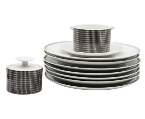 Nine pieces of H.T Baumann and R. Scharrer German China. Seven plates (11 in. diameter)one lidded sugar (4 in. H)one cream an