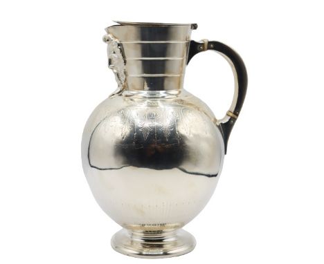 This is a fantastically designed plated silver pitcher. Marked on bottom "Martin, Hall & Co." Size: 9 x 7