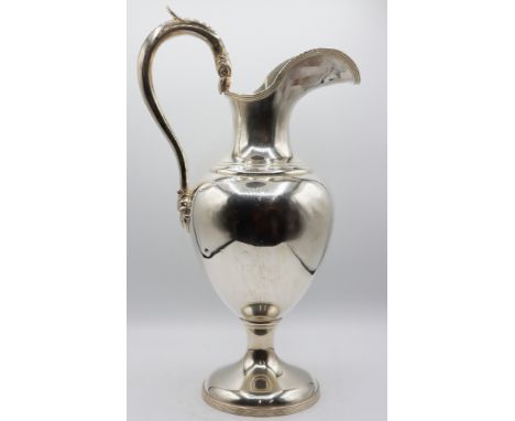 Tall sterling silver pitcher, marked sterling 925/1000 on the underside. The size is 16 x 9 in. Approx 36 OZT